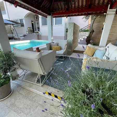 Maris- Beachfront With Exclusive Pool Вилла