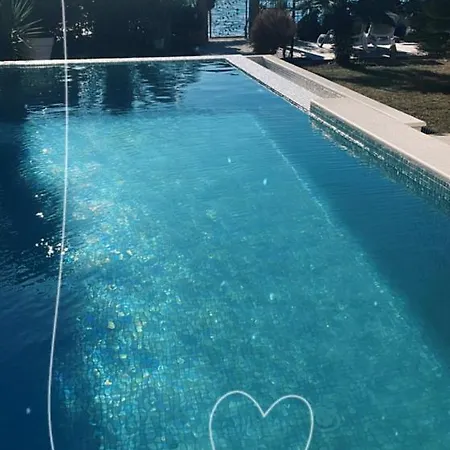 Maris- Beachfront With Exclusive Pool Вилла