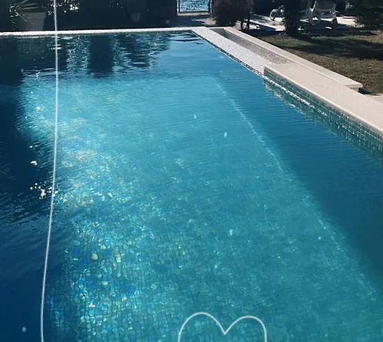 Maris- Beachfront With Exclusive Pool Вилла