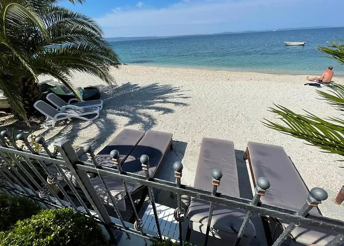 Maris- Beachfront With Exclusive Pool Вилла